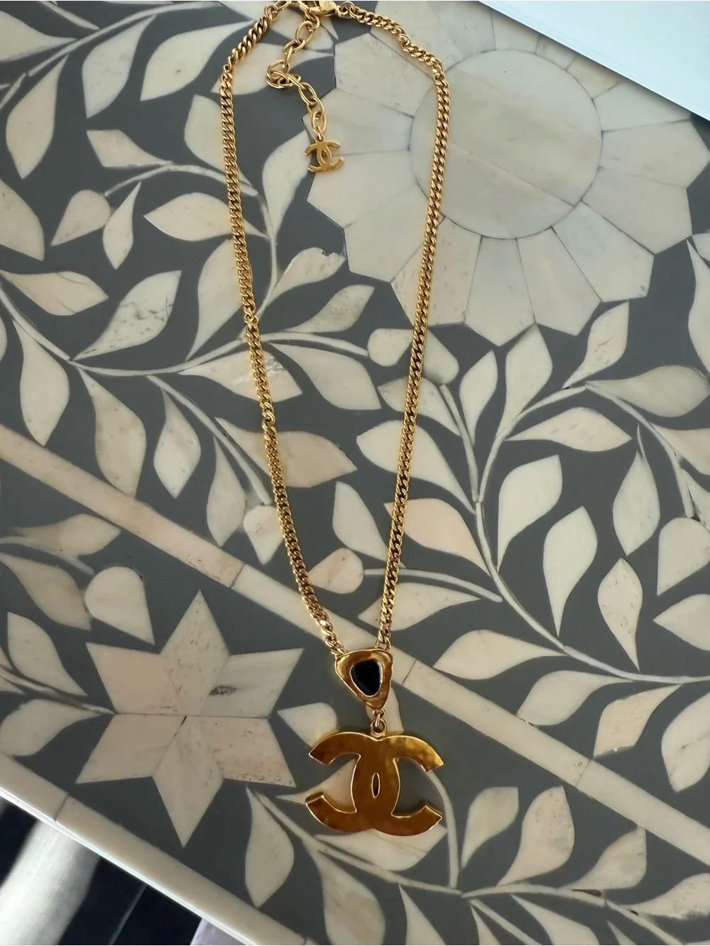 CHANEL gold tone
